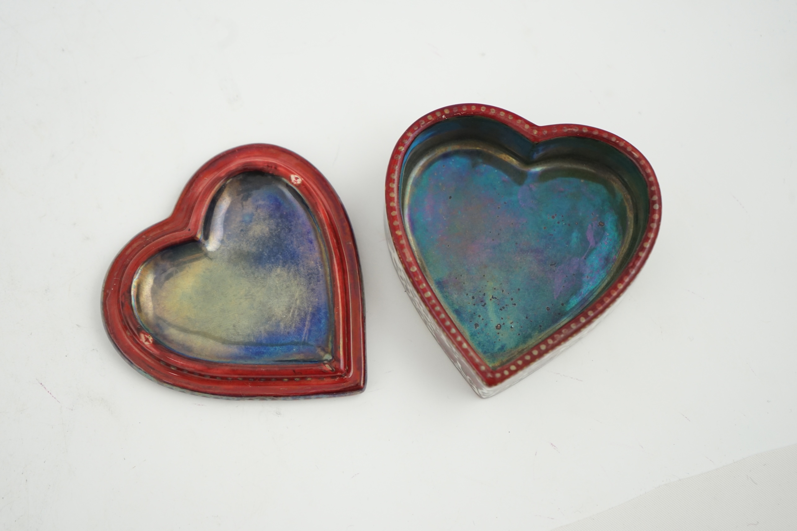 An early Zsolnay flambé lustre heart shaped box and cover, late 19th century